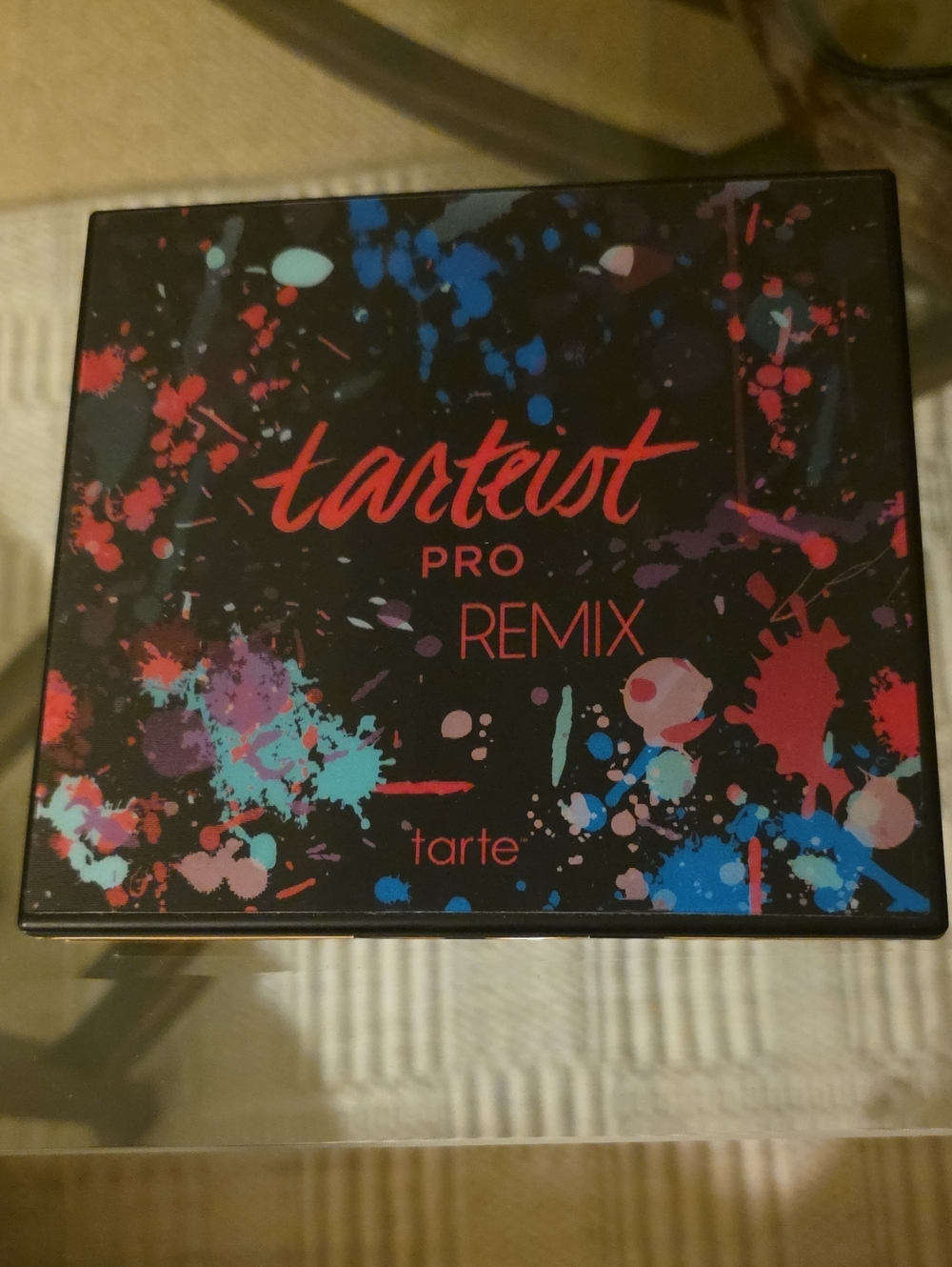 tarte Splash Print Compact Palette in Black with Blue, Pink and Teal Accents